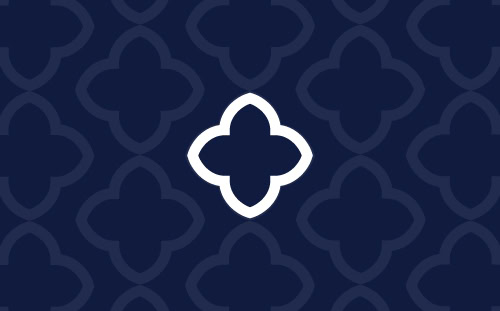 A navy blue background features a repeating quatrefoil pattern with one central shape outlined in white.